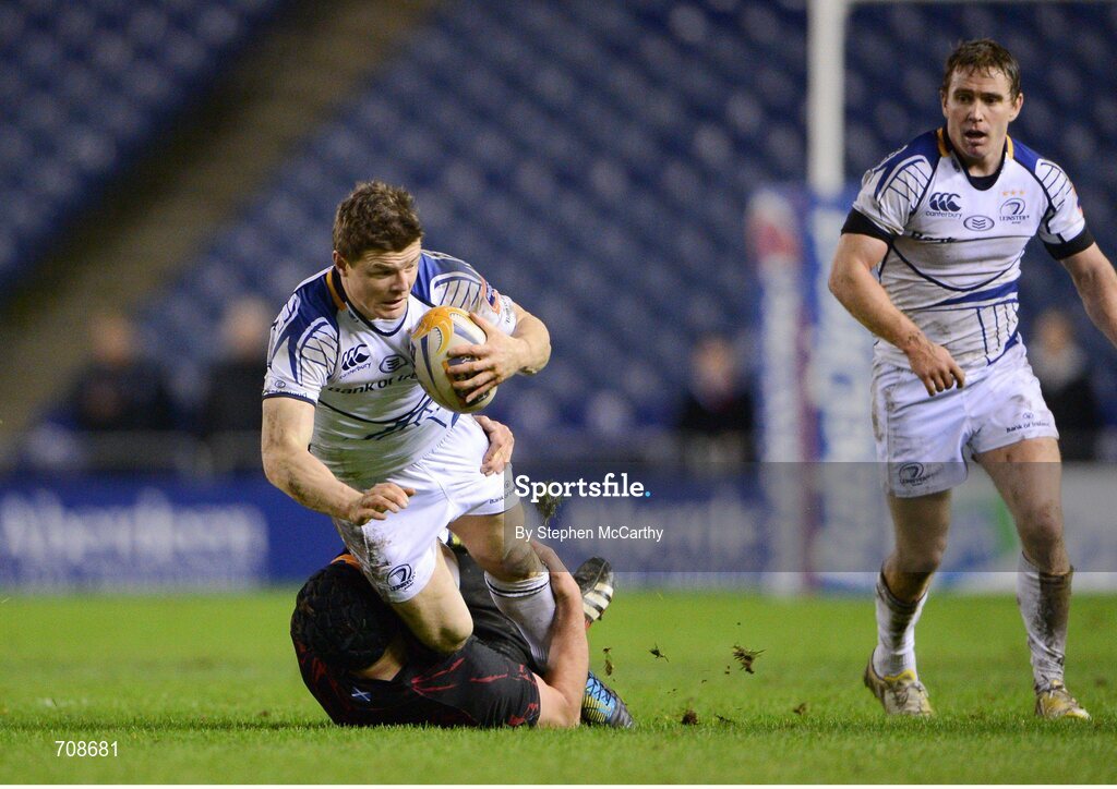 4 January 2013; Brian O'Driscoll, Leinster, with Eoin Reddan in support, is tackled by Grant Gilchrist, Edinburgh. Celtic League 2012/13, Round 13, Edinburgh v Leinster, Murrayfield, Edinburgh, Scotland. Picture credit: Stephen McCarthy / SPORTSFILE