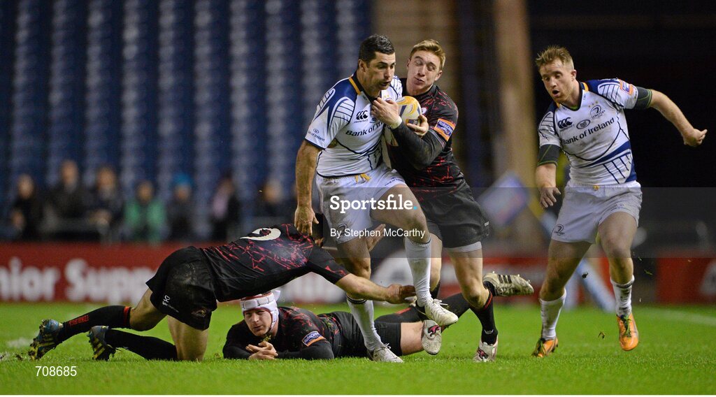 4 January 2013; Rob Kearney, Leinster, is tackled by Edinburgh players, from left, Greig Laidlaw, Andy Titterrell and Dougie Fife. Celtic League 2012/13, Round 13, Edinburgh v Leinster, Murrayfield, Edinburgh, Scotland. Picture credit: Stephen McCarthy / SPORTSFILE