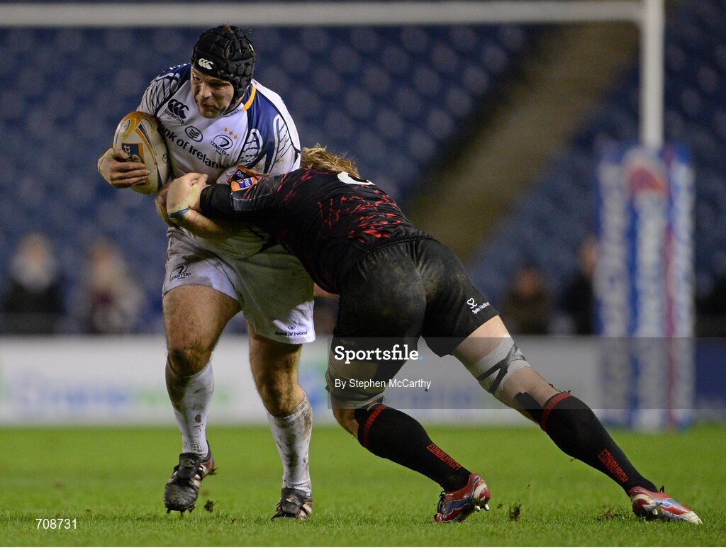 4 January 2013; Mike Ross, Leinster, is tackled by David Denton, Edinburgh. Celtic League 2012/13, Round 13, Edinburgh v Leinster, Murrayfield, Edinburgh, Scotland. Picture credit: Stephen McCarthy / SPORTSFILE