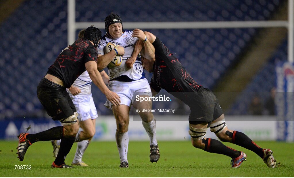 4 January 2013; Mike Ross, Leinster, is tackled by Grant Gilchrist, left, and David Denton, Edinburgh. Celtic League 2012/13, Round 13, Edinburgh v Leinster, Murrayfield, Edinburgh, Scotland. Picture credit: Stephen McCarthy / SPORTSFILE