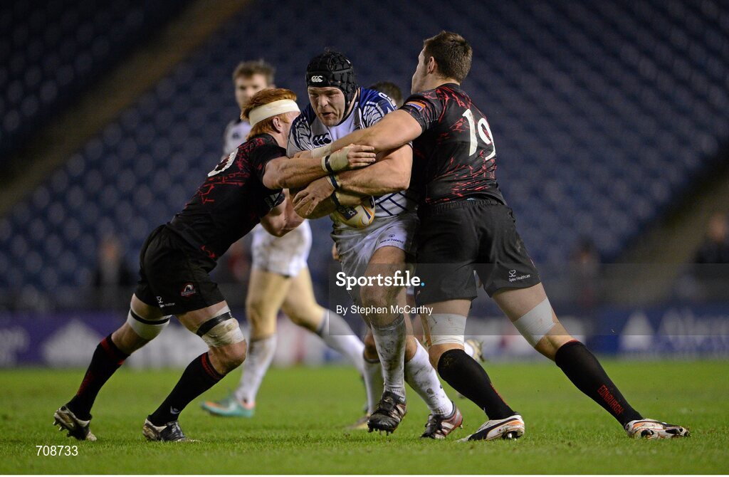 4 January 2013; Mike Ross, Leinster, is tackled by Roddy Grant, left, and Perry Parker, Edinburgh. Celtic League 2012/13, Round 13, Edinburgh v Leinster, Murrayfield, Edinburgh, Scotland. Picture credit: Stephen McCarthy / SPORTSFILE