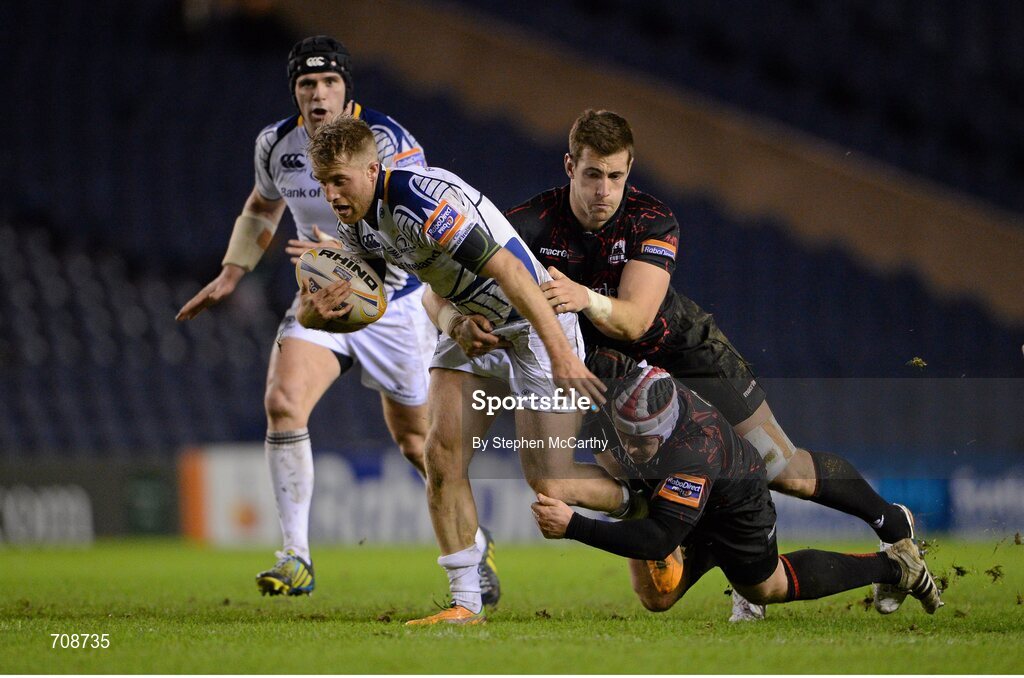4 January 2013; Luke Fitzgerald, Leinster, is tackled by Andy Titterrell, scrum cap, and Perry Parker, Edinburgh. Celtic League 2012/13, Round 13, Edinburgh v Leinster, Murrayfield, Edinburgh, Scotland. Picture credit: Stephen McCarthy / SPORTSFILE
