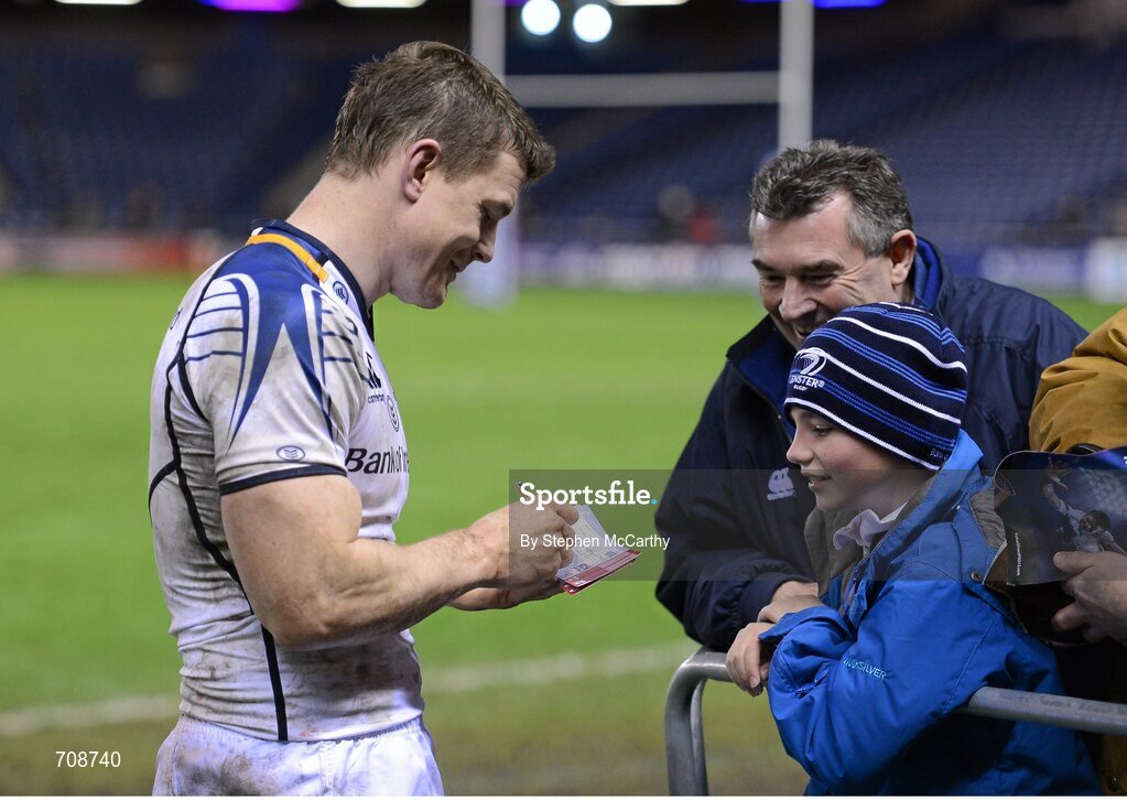 4 January 2013; Brian O'Driscoll, Leinster, signs an autograph after the game. Celtic League 2012/13, Round 13, Edinburgh v Leinster, Murrayfield, Edinburgh, Scotland. Picture credit: Stephen McCarthy / SPORTSFILE