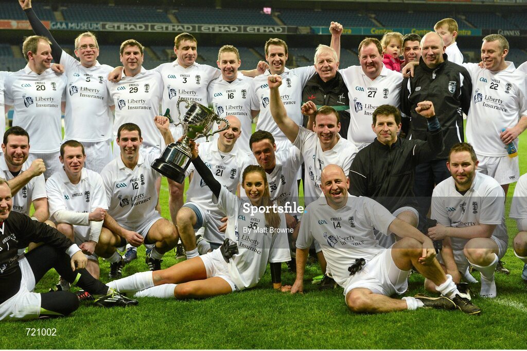 14 February 2013; Roz Purcell lifts the Alan Kerins Projects Cup as her team-mates celebrate after the Alan Kerins GAA Challenge, supported by Liberty Insurance, which took place in Croke Park on Valentine's Day. For more information visit alankerinsprojects.org. Croke Park, Dublin. Picture credit: Matt Browne / SPORTSFILE