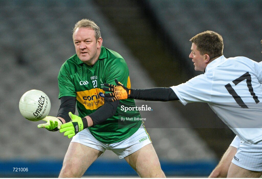 14 February 2013; Pictured is Mick Galwey, lining out for Kerry, in action againsst Stuart Baldwin, lining out for Kildare, at the Alan Kerins GAA Challenge, supported by Liberty Insurance, which took place in Croke Park on Valentine's Day. For more information visit alankerinsprojects.org. Croke Park, Dublin. Picture credit: Matt Browne / SPORTSFILE