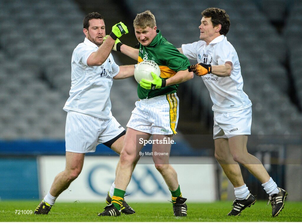 14 February 2013; Pictured is Mike Frank Russell, lining out for Kerry, in action against Eoin Christian, left, and Declan Meehan, lining out for Kildare, at the Alan Kerins GAA Challenge, supported by Liberty Insurance, which took place in Croke Park on Valentine's Day. For more information visit alankerinsprojects.org. Croke Park, Dublin. Picture credit: Matt Browne / SPORTSFILE