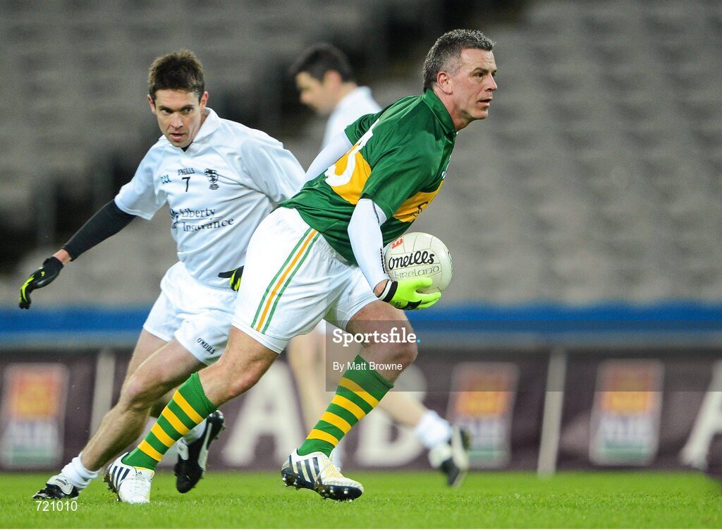 14 February 2013; Pictured is Padraic Joyce, lining out for Kerry, in action against Niall Falls, lining out for Kildare, at the Alan Kerins GAA Challenge, supported by Liberty Insurance, which took place in Croke Park on Valentine's Day. For more information visit alankerinsprojects.org. Croke Park, Dublin. Picture credit: Matt Browne / SPORTSFILE