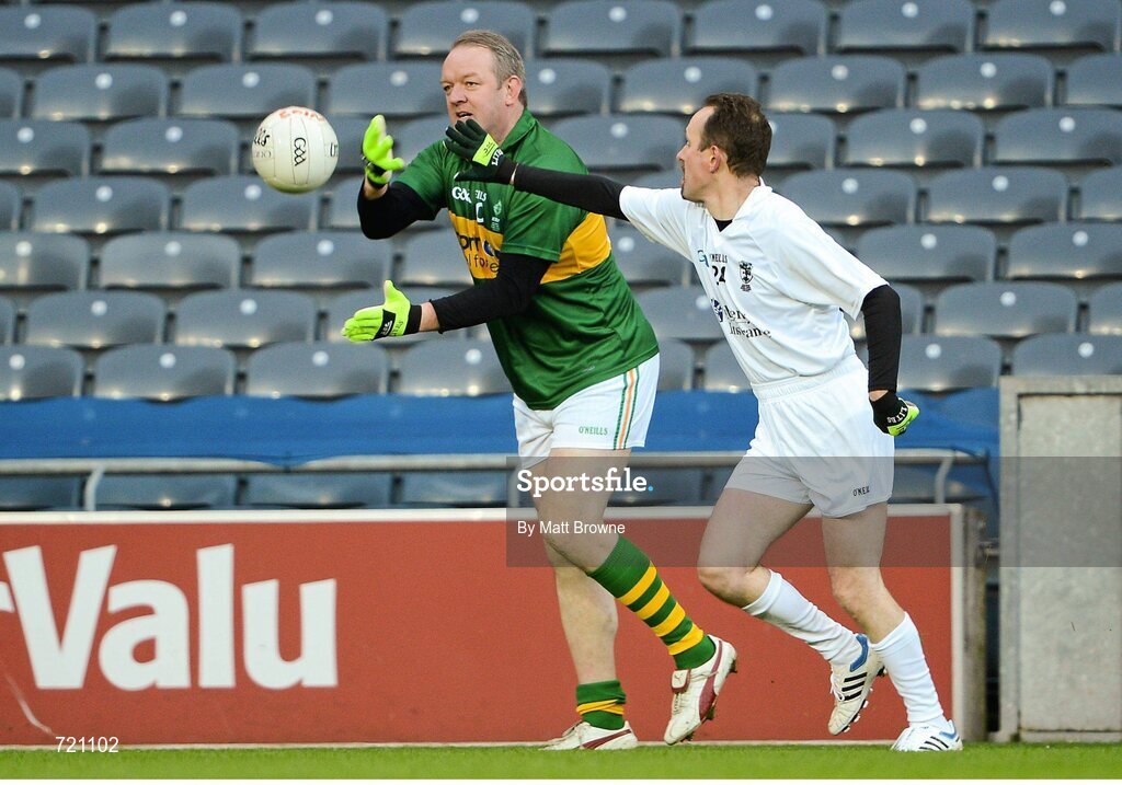 14 February 2013; Mick Galwey, lining out for Kerry, in action against Patrick O'Brien, lining out for Kildare, CEO Liberty Insurance, at the Alan Kerins GAA Challenge, supported by Liberty Insurance, which took place in Croke Park on Valentine's Day. For more information visit alankerinsprojects.org. Croke Park, Dublin. Picture credit: Matt Browne / SPORTSFILE