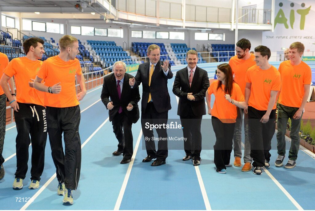 15 February 2013; An Taoiseach Enda Kenny T.D., in the company of Professor Ciarán Ó Catháin, President of AIT and also President of Athletics Ireland, right, and Minister of State with Responsibility for Tourism and Sport Michael Ring T.D., left, and AIT athletics students at the official opening of the Athlone Institute of Technology International Arena. Athlone Institute of Technology International Arena, Athlone, Co. Westmeath. Picture credit: Stephen McCarthy / SPORTSFILE