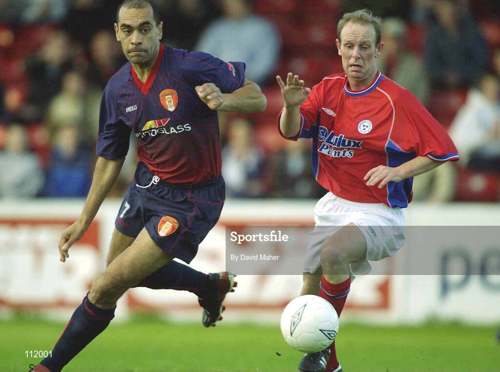 2 May 2003; Thomas Morgan, Shelbourne, in action against Paul Osam, St. Patricks Athletic. eircom League, Premier Division, Shelbourne v St. Patricks Athletic, Tolka Park, Dublin. Soccer. Picture credit; David Maher / SPORTSFILE *EDI*