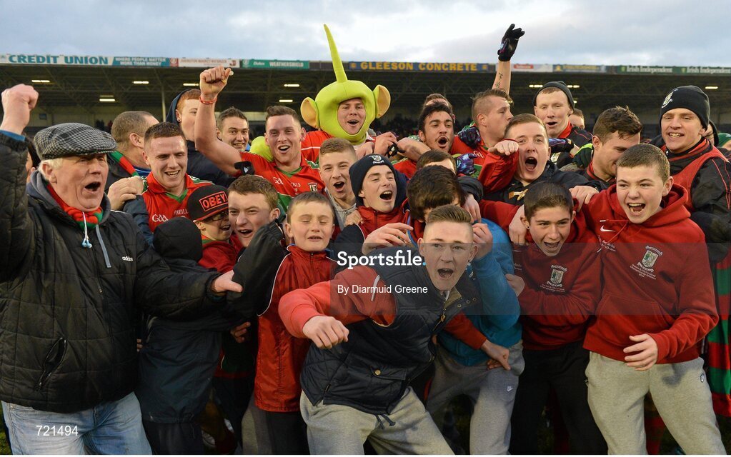 16 February 2013; Ballymun Kickhams supporters celebrate with players after victory over Dr. Crokes. AIB GAA Football All-Ireland Senior Club Championship, Semi-Final, St Brigid’s, Dr. Crokes, Kerry v Ballymun Kickhams, Dublin, Semple Stadium, Thurles, Co. Tipperary. Picture credit: Diarmuid Greene / SPORTSFILE