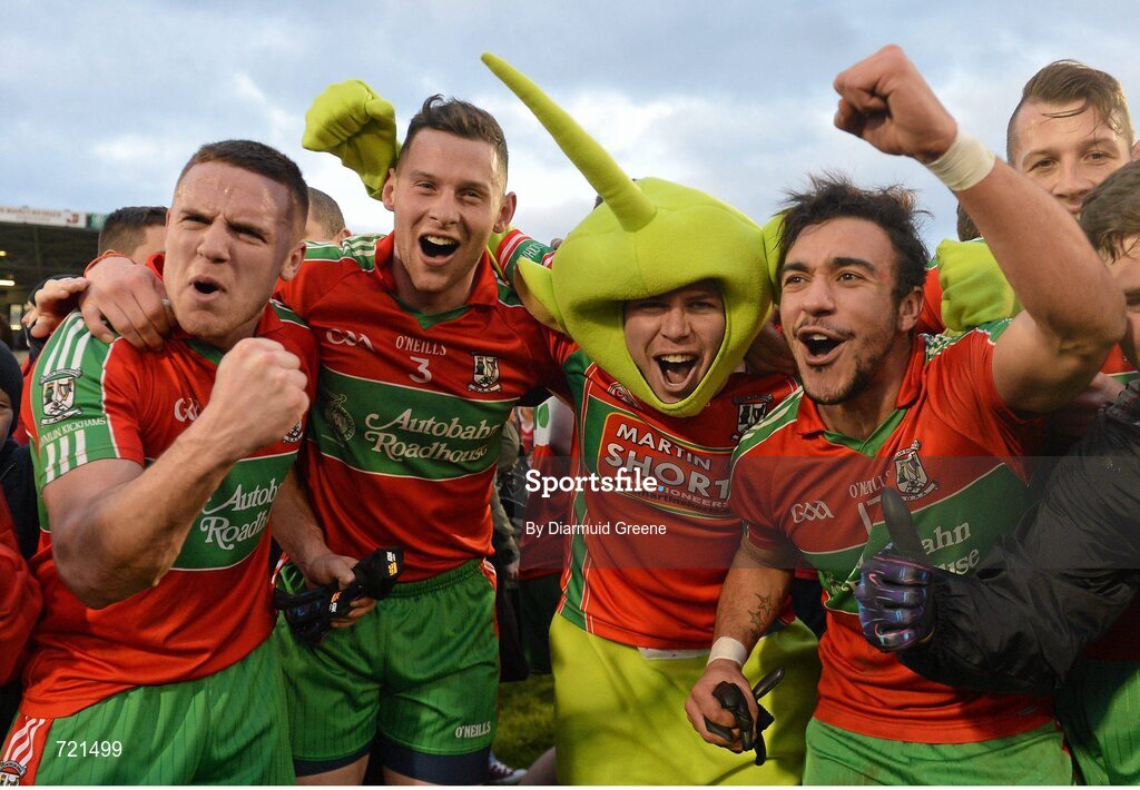 16 February 2013; Ballymun Kickhams supporter Daragh Joyce celebrates with players, from left to right, Davey Byrne, Philip McMahon and Ted Furman, after victory over Dr. Crokes. AIB GAA Football All-Ireland Senior Club Championship, Semi-Final, St Brigid’s, Dr. Crokes, Kerry v Ballymun Kickhams, Dublin, Semple Stadium, Thurles, Co. Tipperary. Picture credit: Diarmuid Greene / SPORTSFILE
