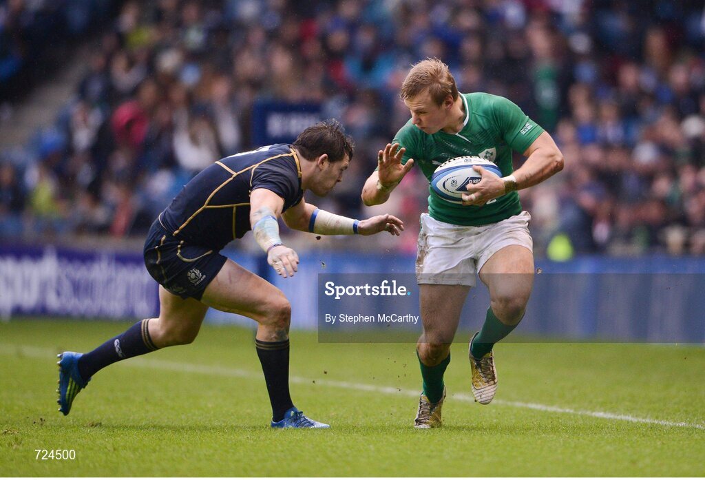 24 February 2013; Luke Marshall, Ireland, is tackled by Sean Lamont, Scotland. RBS Six Nations Rugby Championship, Scotland v Ireland, Murrayfield Stadium, Edinburgh, Scotland. Picture credit: Stephen McCarthy / SPORTSFILE
