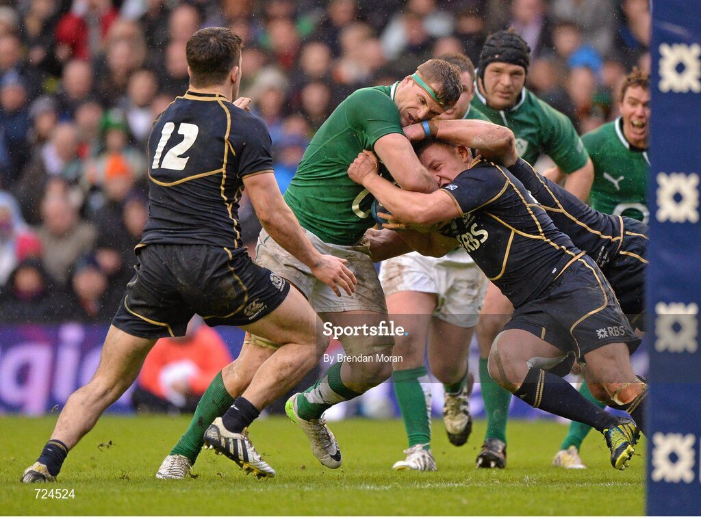 24 February 2013; Jamie Heaslip, Ireland, is held up short of the line by Duncan Weir, Scotland, in the last play of the game. RBS Six Nations Rugby Championship, Scotland v Ireland, Murrayfield Stadium, Edinburgh, Scotland. Picture credit: Brendan Moran / SPORTSFILE