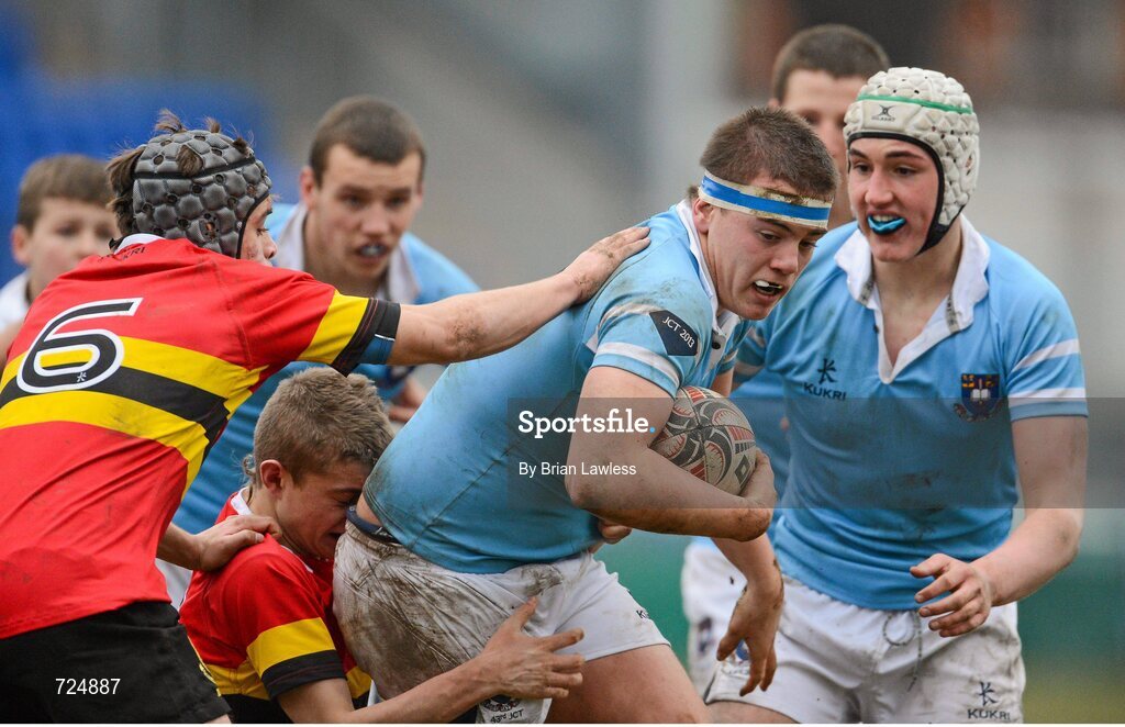 26 February 2013; Sam Griffen, St. Michael’s College, is tackled by Willam Fay and Cameron Madden, left, CBC Monkstown. Powerade Leinster Schools Junior Cup, Quarter-Final, St. Michael’s College v CBC Monkstown, Donnybrook Stadium, Donnybrook, Dublin. Picture credit: Brian Lawless / SPORTSFILE