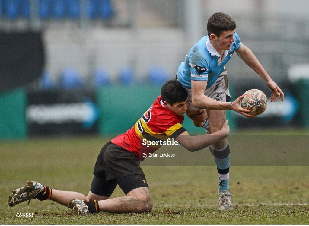 26 February 2013; Jack Kelly, St. Michael’s College, is tackled by Patrick Rogers, CBC Monkstown. Powerade Leinster Schools Junior Cup, Quarter-Final, St. Michael’s College v CBC Monkstown, Donnybrook Stadium, Donnybrook, Dublin. Picture credit: Brian Lawless / SPORTSFILE