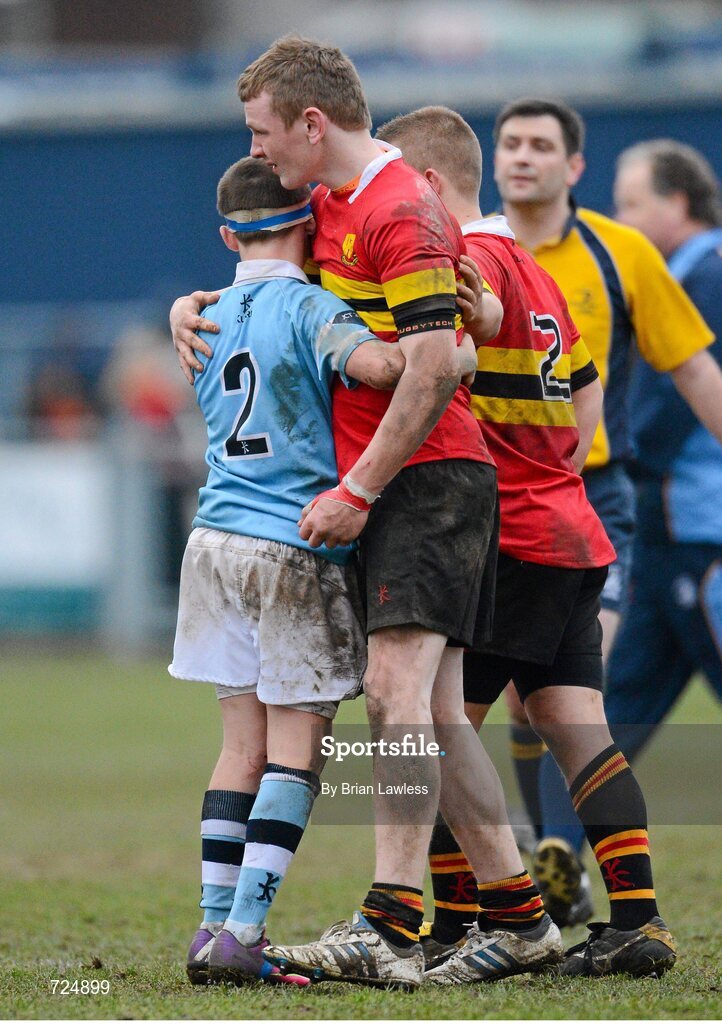 26 February 2013; William Fay, CBC Monkstown, is consoled by Tom Glynn, St. Michael's College, left, after the match. Powerade Leinster Schools Junior Cup, Quarter-Final, St. Michael’s College v CBC Monkstown, Donnybrook Stadium, Donnybrook, Dublin. Picture credit: Brian Lawless / SPORTSFILE