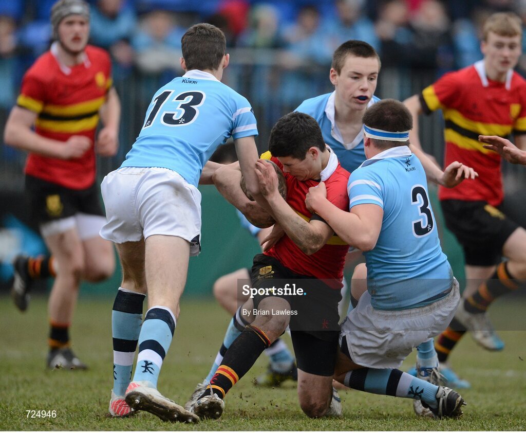 26 February 2013; Patrick Rogers, CBC Monkstown, is tackled by Jack Kelly, left, and Sam Griffen, St. Michael’s College. Powerade Leinster Schools Junior Cup, Quarter-Final, St. Michael’s College v CBC Monkstown, Donnybrook Stadium, Donnybrook, Dublin. Picture credit: Brian Lawless / SPORTSFILE