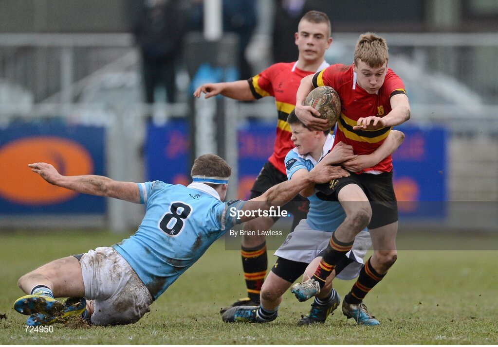 26 February 2013; Darragh Spillane, CBC Monkstown, is tackled by Harry Byrne and Barry Fitzpatrick, left, St. Michael’s College. Powerade Leinster Schools Junior Cup, Quarter-Final, St. Michael’s College v CBC Monkstown, Donnybrook Stadium, Donnybrook, Dublin. Picture credit: Brian Lawless / SPORTSFILE