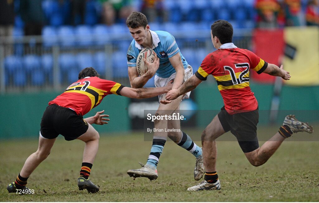 26 February 2013; Jack Kelly, St. Michael’s College, is tackled by Robert Chadwick and Patrick Rogers, right, CBC Monkstown. Powerade Leinster Schools Junior Cup, Quarter-Final, St. Michael’s College v CBC Monkstown, Donnybrook Stadium, Donnybrook, Dublin. Picture credit: Brian Lawless / SPORTSFILE