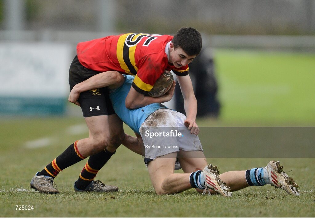 26 February 2013; Tom Kelly, CBC Monkstown, is tackled by Harry McIntyre, St. Michael’s College. Powerade Leinster Schools Junior Cup, Quarter-Final, St. Michael’s College v CBC Monkstown, Donnybrook Stadium, Donnybrook, Dublin. Picture credit: Brian Lawless / SPORTSFILE