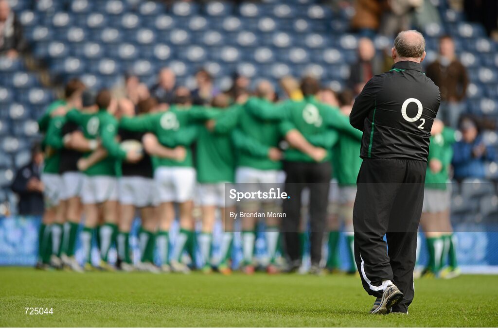24 February 2013; Ireland head coach Declan Kidney watches as his players go into a huddle before the game. RBS Six Nations Rugby Championship, Scotland v Ireland, Murrayfield Stadium, Edinburgh, Scotland. Picture credit: Brendan Moran / SPORTSFILE
