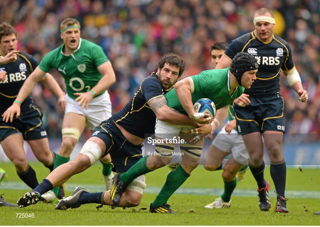 24 February 2013; Sean O'Brien, Ireland, is tackled by Jim Hamilton, Scotland. RBS Six Nations Rugby Championship, Scotland v Ireland, Murrayfield Stadium, Edinburgh, Scotland. Picture credit: Brendan Moran / SPORTSFILE