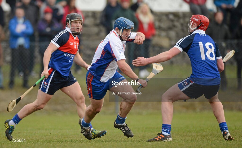 1 March 2013; Robert O'Donnell, Mary Immaculate College, Limerick, in action against Pauric Mahony and Jake Dillon, left, Waterford Institute of Technology. Irish Daily Mail Fitzgibbon Cup Semi-Final, Waterford Institute of Technology v Mary Immaculate College, Limerick, Carnmore GAA Club, Carnmore, Co. Galway. Picture credit: Diarmuid Greene / SPORTSFILE