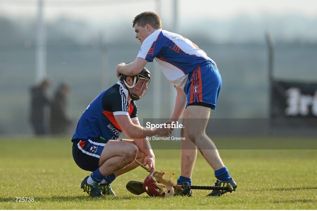 1 March 2013; Jake Dillon, Waterford Institute of Technology, is consoled by Cillian Fennessy, Mary Immaculate College, Limerick, after the game. Irish Daily Mail Fitzgibbon Cup Semi-Final, Waterford Institute of Technology v Mary Immaculate College, Limerick, Carnmore GAA Club, Carnmore, Co. Galway. Picture credit: Diarmuid Greene / SPORTSFILE