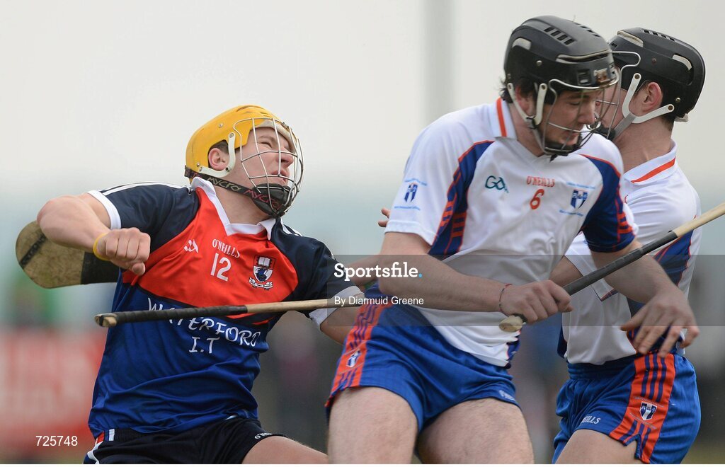 1 March 2013; Eoin Murphy, Waterford Institute of Technology, is challenged by Declan Hannon, Mary Immaculate College, Limerick. Hannon was subsequently shown a straight red card. Irish Daily Mail Fitzgibbon Cup Semi-Final, Waterford Institute of Technology v Mary Immaculate College, Limerick, Carnmore GAA Club, Carnmore, Co. Galway. Picture credit: Diarmuid Greene / SPORTSFILE