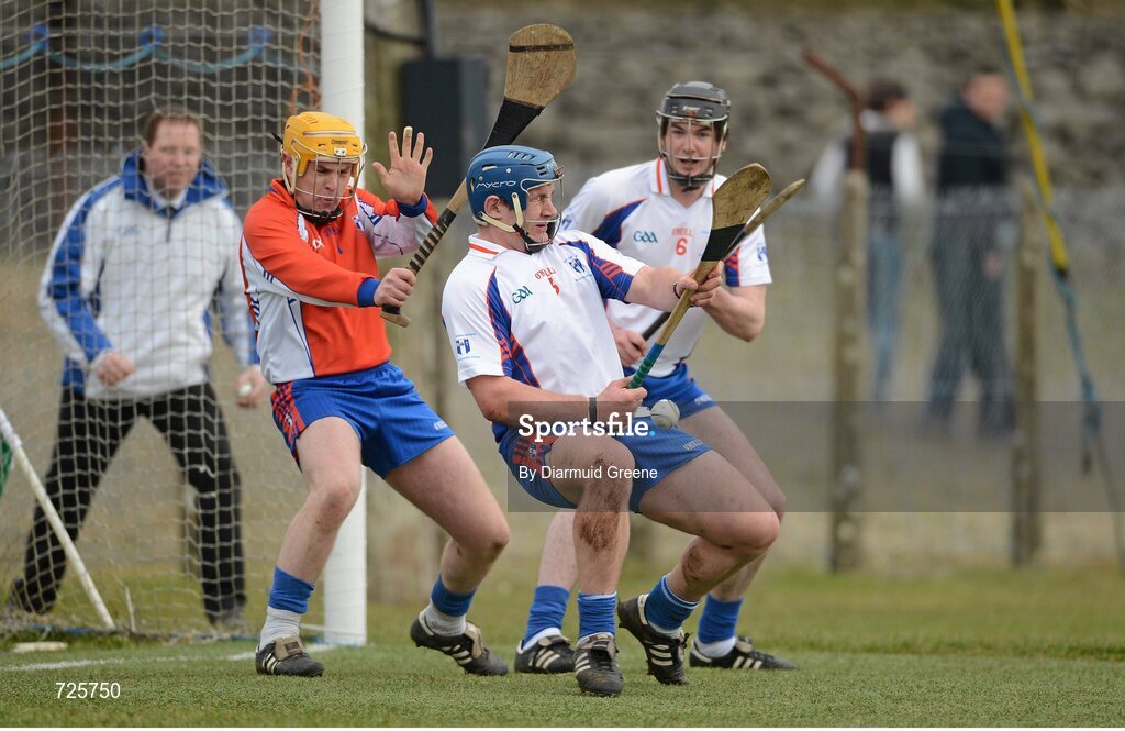 1 March 2013; Robert O'Donnell, Mary Immaculate College, Limerick, supported by goalkeeper Shane Nolan and Declan Hannon, saves a penalty from Eoin Murphy, Waterford Institute of Technology. Irish Daily Mail Fitzgibbon Cup Semi-Final, Waterford Institute of Technology v Mary Immaculate College, Limerick, Carnmore GAA Club, Carnmore, Co. Galway. Picture credit: Diarmuid Greene / SPORTSFILE