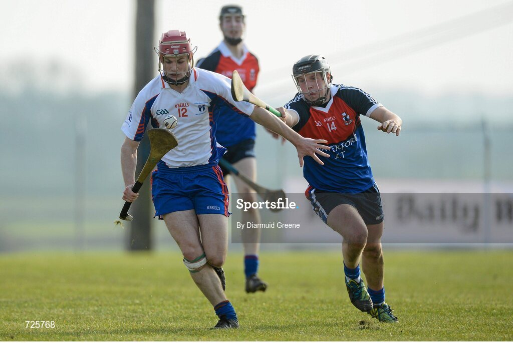 1 March 2013; Sean Curran, Mary Immaculate College, Limerick, in action against Jake Dillon, Waterford Institute of Technology. Irish Daily Mail Fitzgibbon Cup Semi-Final, Waterford Institute of Technology v Mary Immaculate College, Limerick, Carnmore GAA Club, Carnmore, Co. Galway. Picture credit: Diarmuid Greene / SPORTSFILE