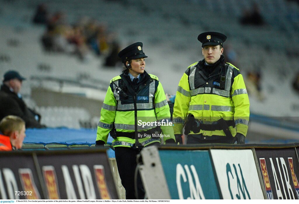 2 March 2013; Two Gardaí patrol the perimiter of the pitch before the game. Allianz Football League, Division 1, Dublin v Mayo, Croke Park, Dublin. Picture credit: Ray McManus / SPORTSFILE