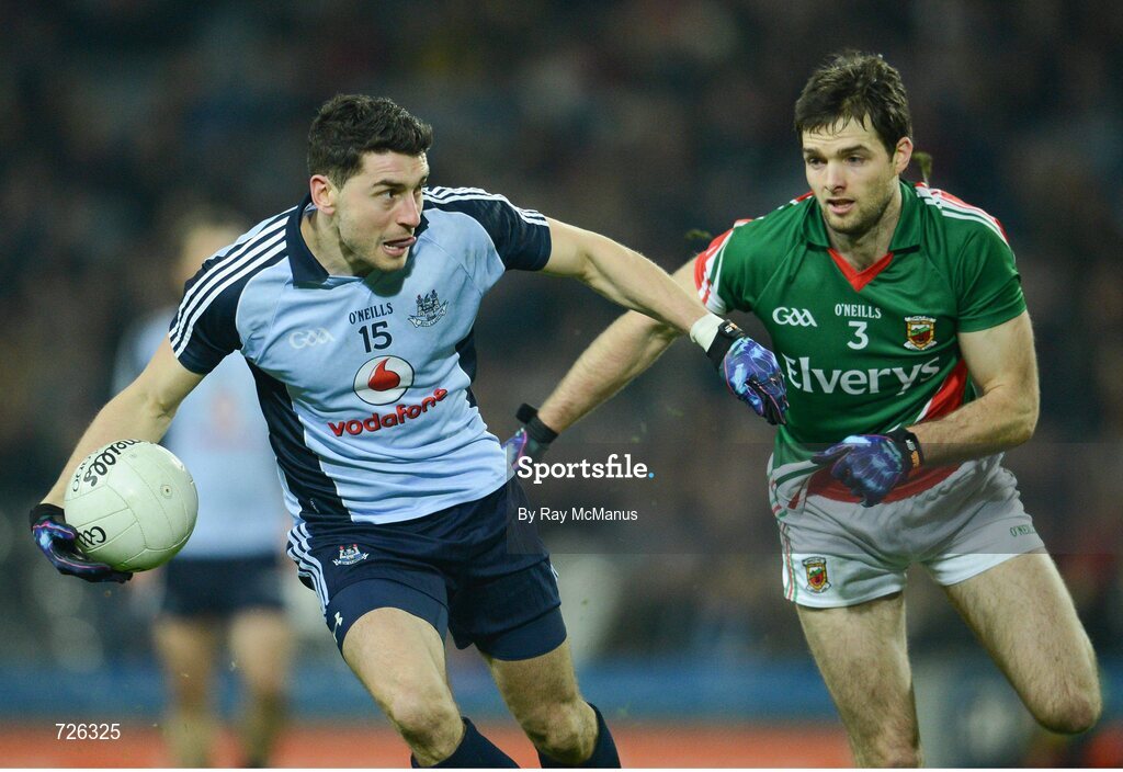 2 March 2013; Bernard Brogan, Dublin, is tackled by Mayo full back Ger Cafferkey. Allianz Football League, Division 1, Dublin v Mayo, Croke Park, Dublin. Picture credit: Ray McManus / SPORTSFILE