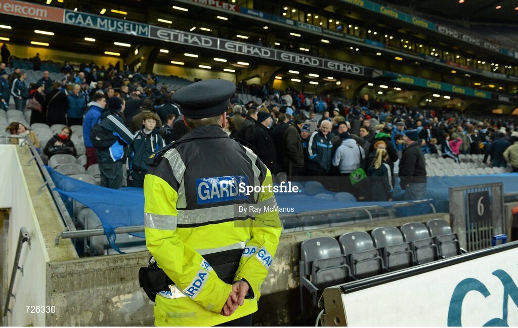 2 March 2013; A member of An Garda Síochána looks on as patrons leave the Cusack Stand after the game. Allianz Football League, Division 1, Dublin v Mayo, Croke Park, Dublin. Picture credit: Ray McManus / SPORTSFILE
