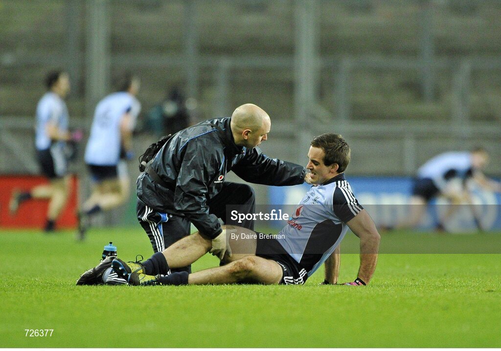 2 March 2013; Tomás Brady, Dublin, receives medical attention from Ciarán O'Reilly, an injury which resulted in his substitution. Allianz Football League, Division 1, Dublin v Mayo, Croke Park, Dublin. Picture credit: Dáire Brennan / SPORTSFILE