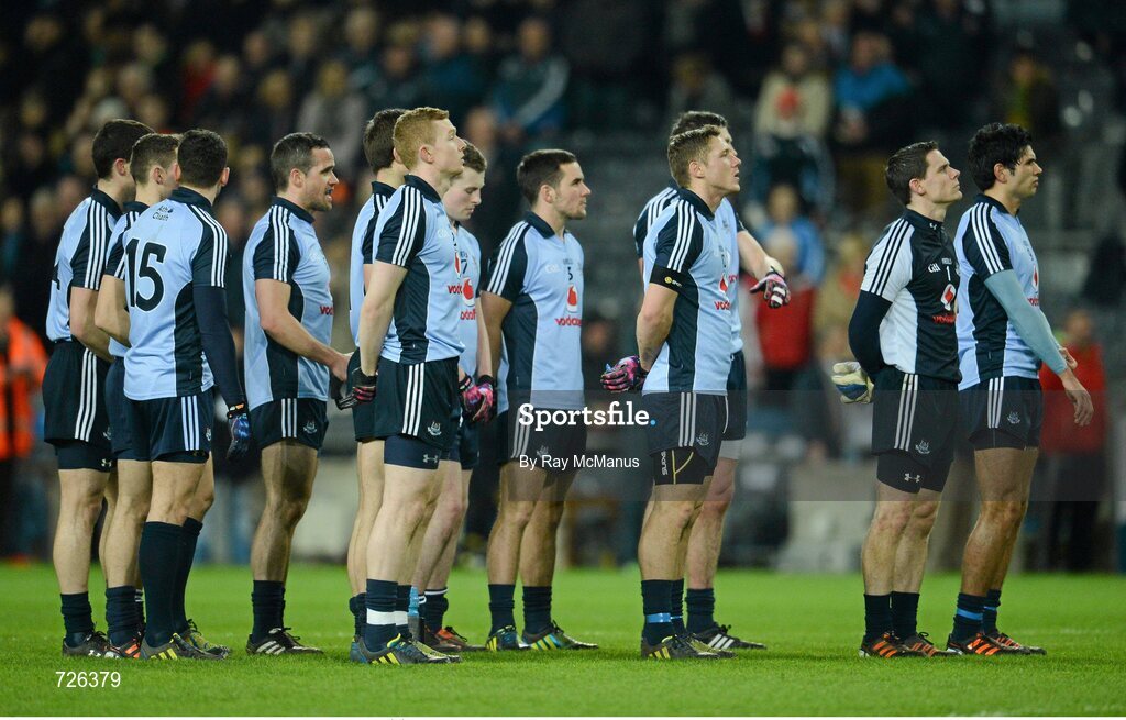 2 March 2013; Dublin players stand during a minutes silence to honour the late broadcaster and journalist Seán Óg Ó Ceallacháin. Allianz Football League, Division 1, Dublin v Mayo, Croke Park, Dublin. Picture credit: Ray McManus / SPORTSFILE
