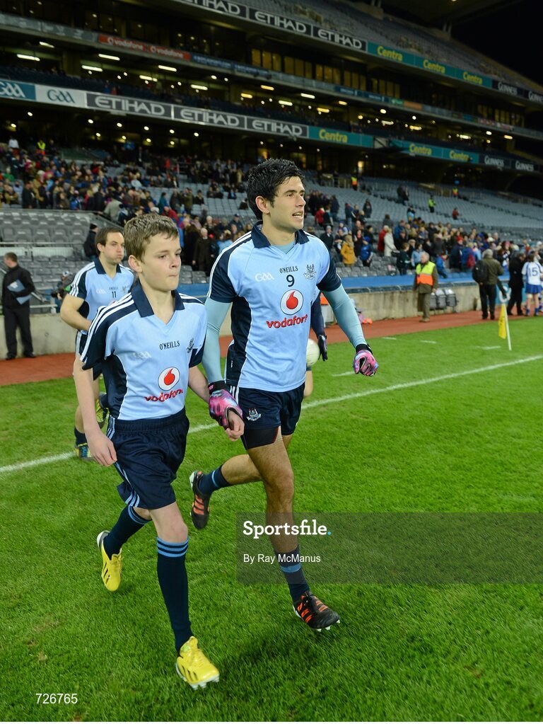2 March 2013; Match mascot Mark Cleary, aged 12, from Raheny GAA, and Cian O'Sullivan run out for the game. Allianz Football League, Division 1, Dublin v Mayo, Croke Park, Dublin. Picture credit: Ray McManus / SPORTSFILE
