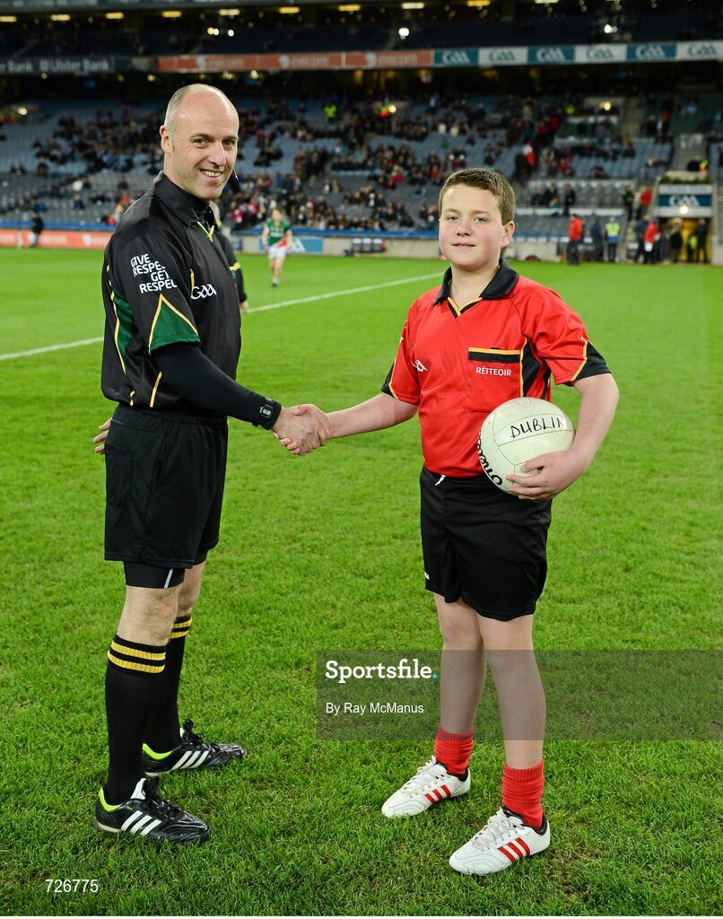 2 March 2013; Jack Roche, aged 11, Trinity Gaels, and match referee Cormac Reilly before the game. Allianz Football League, Division 1, Dublin v Mayo, Croke Park, Dublin. Picture credit: Ray McManus / SPORTSFILE