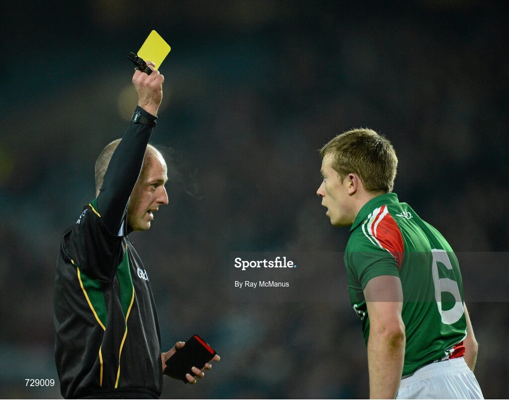 2 March 2013; Referee Cormac Reilly issues a 'yellow card' to Mayo's Donal Vaughan. Allianz Football League, Division 1, Dublin v Mayo, Croke Park, Dublin. Picture credit: Ray McManus / SPORTSFILE