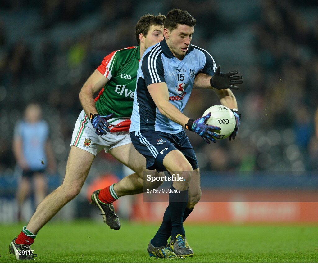 2 March 2013; Bernard Brogan, Dublin, is tackled by Mayo full back Ger Cafferkey. Allianz Football League, Division 1, Dublin v Mayo, Croke Park, Dublin. Picture credit: Ray McManus / SPORTSFILE