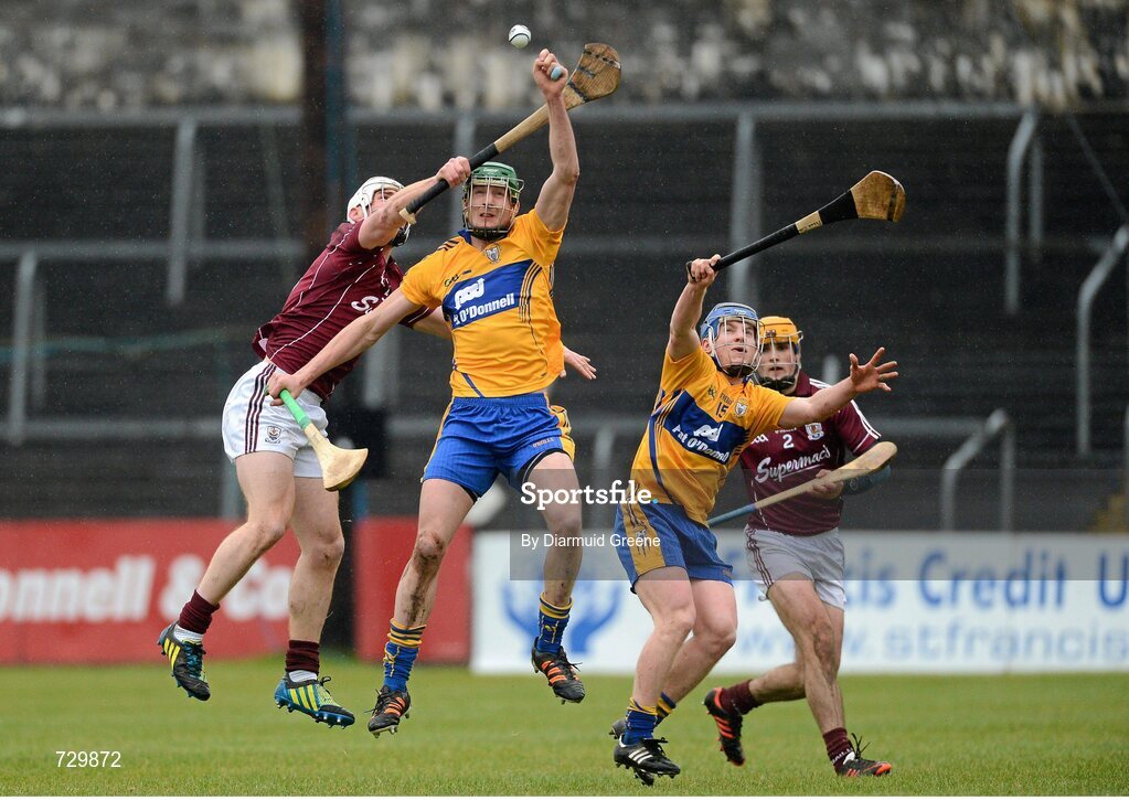 10 March 2013; Enda Barrett, left, and Padraic Collins, Clare, in action against Niall O'Donoghue, left, and Johnny Coen, Galway. Allianz Hurling League, Division 1A, Clare v Galway, Cusack Park, Ennis, Co. Clare. Picture credit: Diarmuid Greene / SPORTSFILE