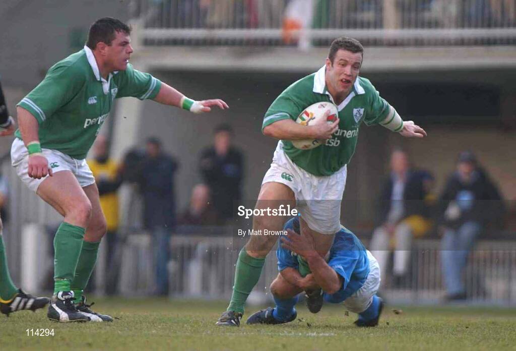 22 February 2003; Kevin Maggs, Ireland, is tackled by Alessandro Troncon, Italy. RBS Six Nations Rugby Championship, Italy v Ireland, Stadio Flaminio, Rome, Italy.  Picture credit; Matt Browne / SPORTSFILE *EDI*