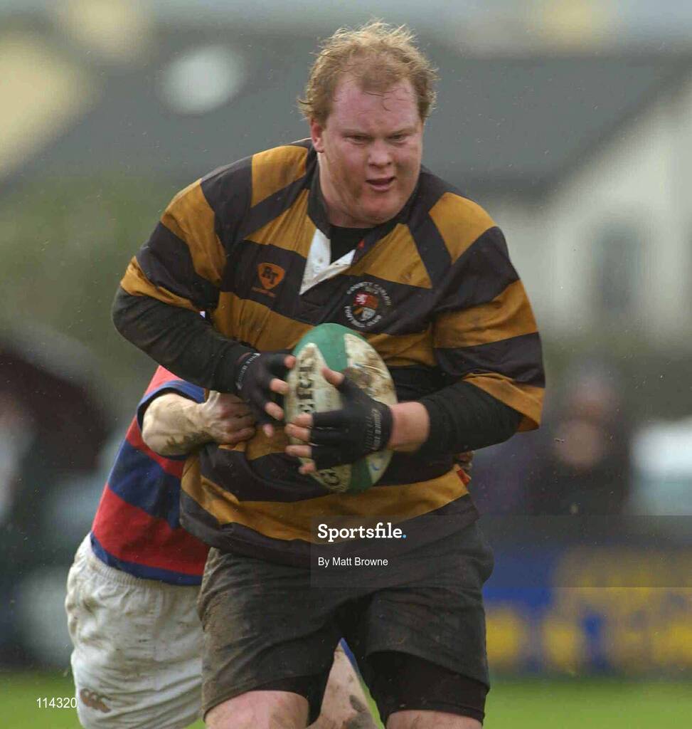 1 March 2003; Andrew Melville, Carlow, is tackled by Dave Hewitt, Clontarf. AIB League Division One, County Carlow v Clontarf, Oak Park, Co. Carlow. Picture credit; Matt Browne / SPORTSFILE *EDI*