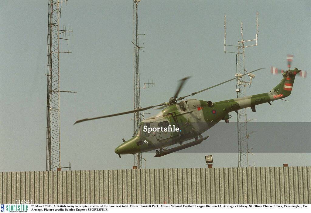23 March 2003; A British Army helicopter arrives at the base next to St. Oliver Plunkett Park. Allianz National Football League Division 1A, Armagh v Galway, St. Oliver Plunkett Park, Crossmaglen, Co. Armagh. Picture credit; Damien Eagers / SPORTSFILE