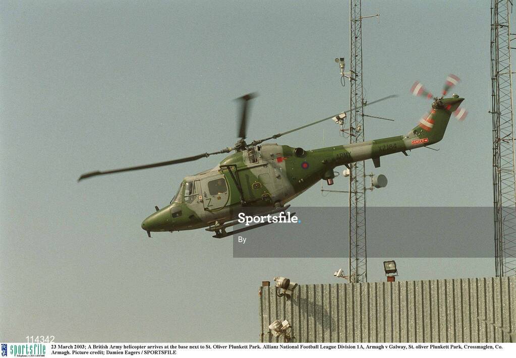 23 March 2003; A British Army helicopter arrives at the base next to St. Oliver Plunkett Park. Allianz National Football League Division 1A, Armagh v Galway, St. oliver Plunkett Park, Crossmaglen, Co. Armagh. Picture credit; Damien Eagers / SPORTSFILE