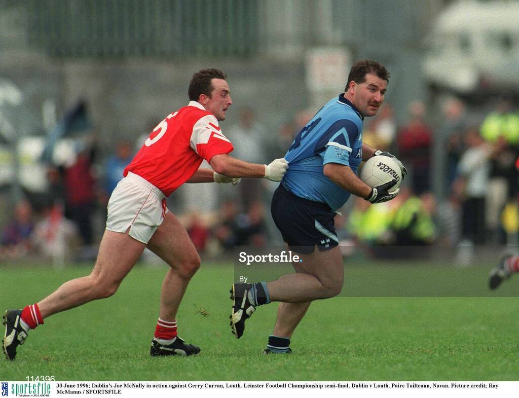 30 June 1996; Dublin's Joe McNally in action against Gerry Curran, Louth. Leinster Football Championship semi-final, Dublin v Louth, Pairc Tailteann, Navan. Picture credit; Ray McManus / SPORTSFILE