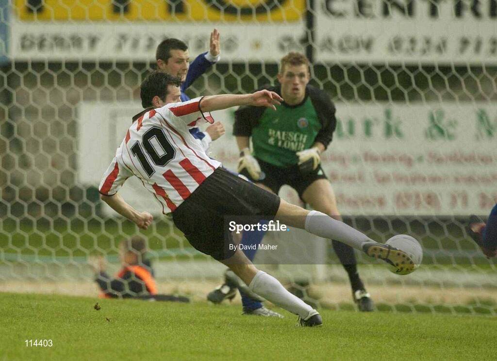 29 May 2003; Ciaran Martyn, Derry City, fires the ball past Waterford United's Thomas Hughes and goalkeeper Dan Connor to score his sides second goal. eircom league, Premier Division, Derry City v Waterford United, Brandywell, Derry. Soccer. Picture credit; David Maher / SPORTSFILE *EDI*