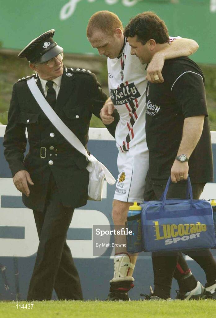 30 May 2003; Glen Crowe, Bohemians, leaves the field with the team physio. eircom league, Premier Division, St. Patrick's Athletic v Bohemians, Richmond Park, Dublin. Soccer. Picture credit; Matt Browne / SPORTSFILE *EDI*