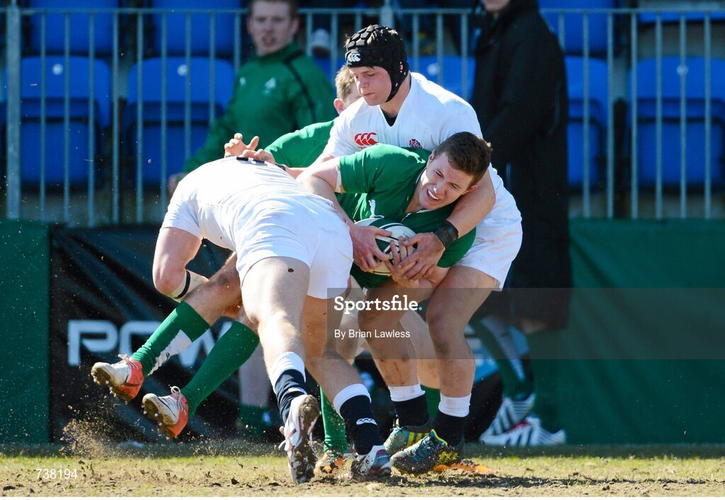 3 April 2013; Rory O'Loughlin, Ireland, is tackled by Adam Jameson, left, and Harry Thacker, England. U19 Friendly, Ireland U19 v England U19, Donnybrook Stadium, Donnybrook, Dublin. Picture credit: Brian Lawless / SPORTSFILE